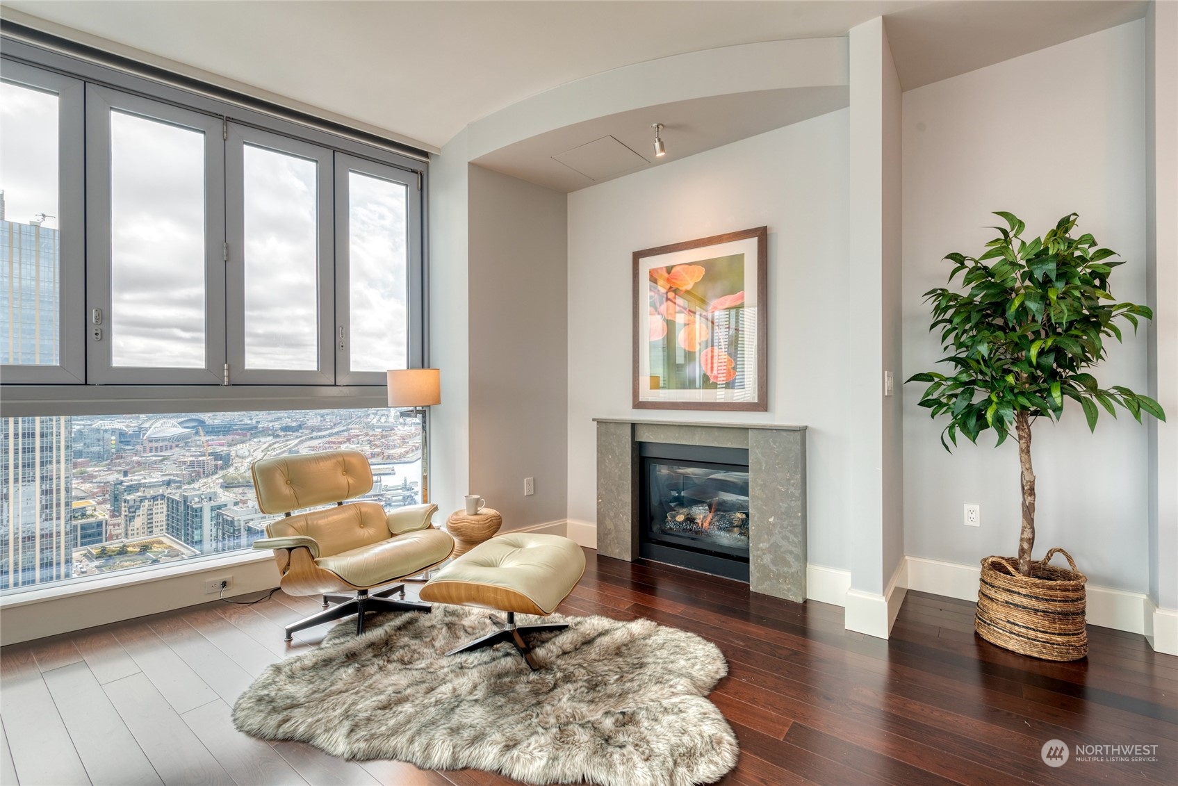 1521 2nd Avenue, Unit 3601 Seattle, WA 98101 - Photo 12 of 39 a living room with furniture and a fireplace