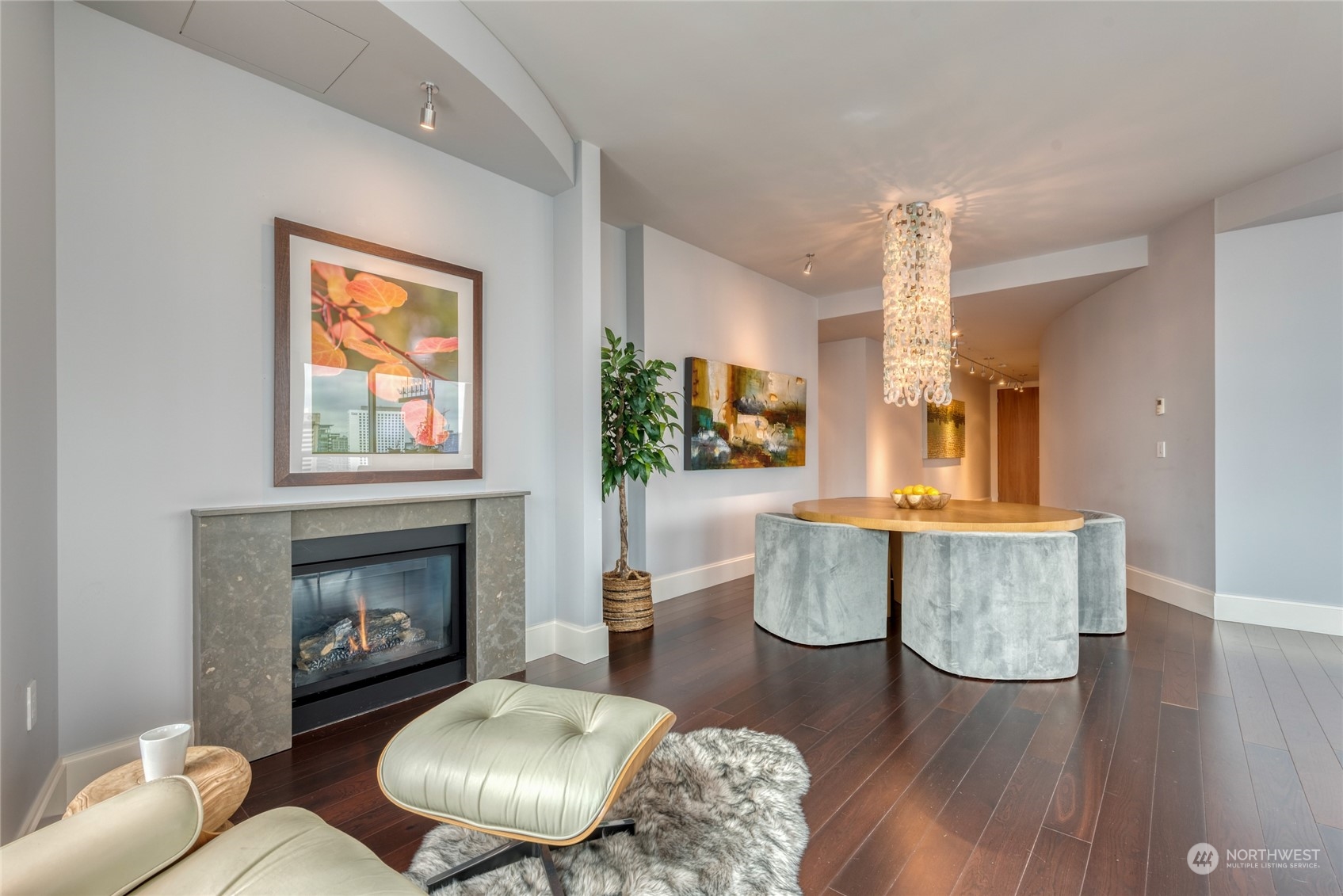 1521 2nd Avenue, Unit 3601 Seattle, WA 98101 - Photo 17 of 38 a living room with furniture and a fireplace