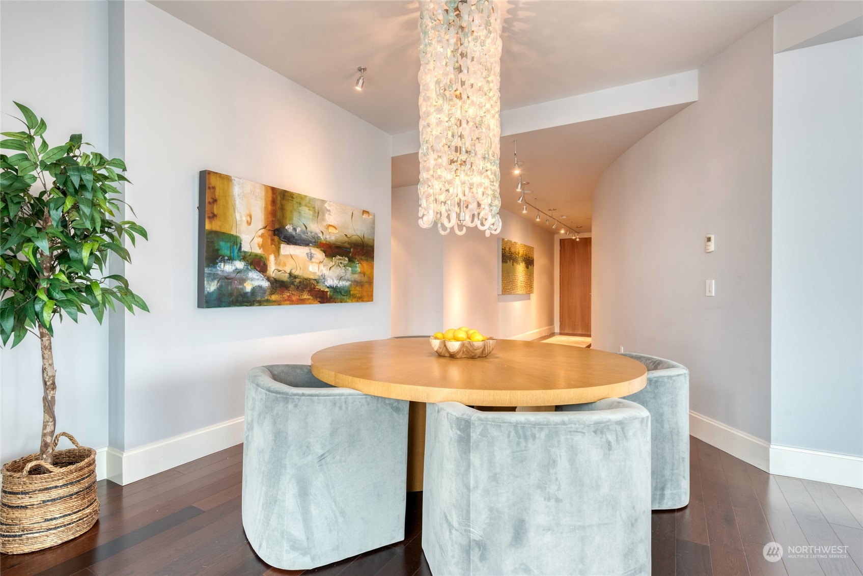 1521 2nd Avenue, Unit 3601 Seattle, WA 98101 - Photo 19 of 39 a dining room with table and chairs