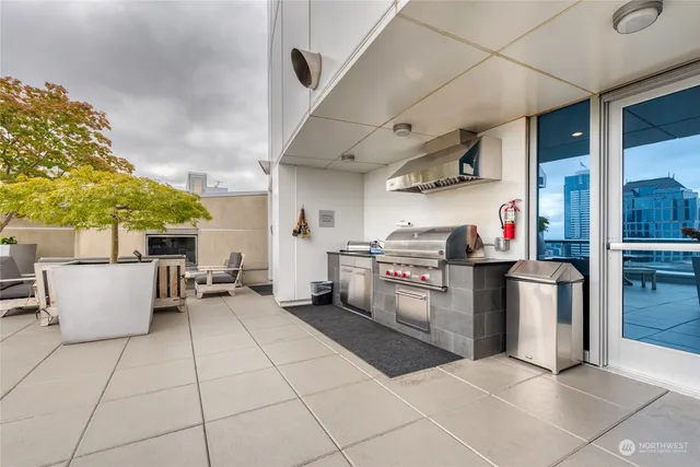 a view of balcony with furniture