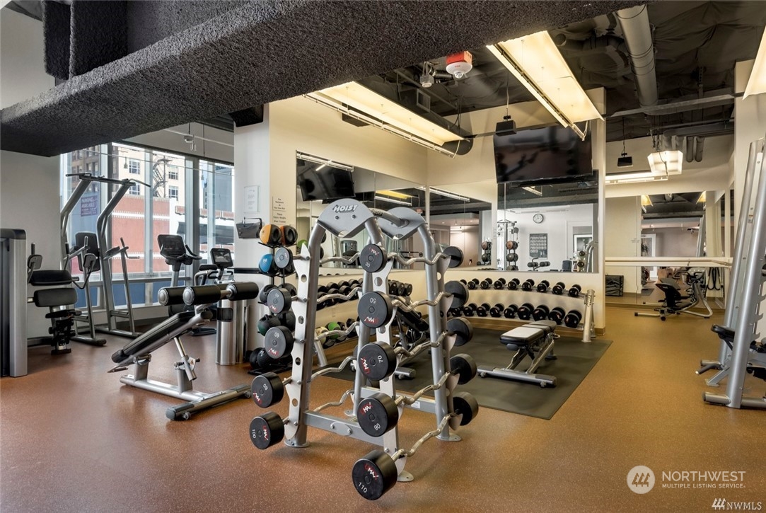 1521 2nd Avenue, Unit 3601 Seattle, WA 98101 - Photo 36 of 39 a view of a room with gym equipment