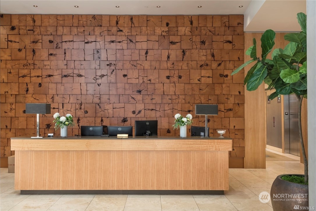 1521 2nd Avenue, Unit 3601 Seattle, WA 98101 - Photo 37 of 39 a room with a couch