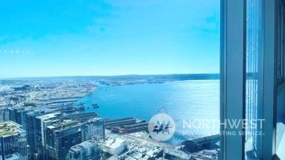 1521 2nd Avenue, Unit 3601 Seattle, WA 98101 - Photo 39 of 39 a view of a room with floor to ceiling window and wooden floor