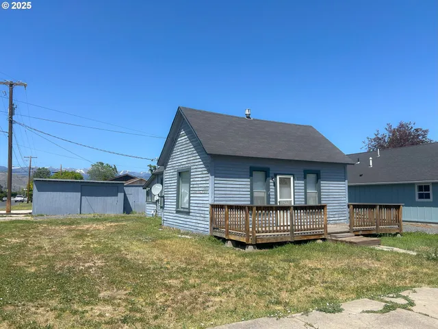 a house view with a garden space