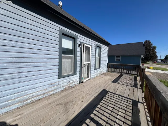 a view of a room with wooden walls