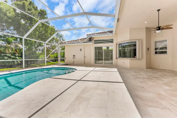 a view of a backyard of the house