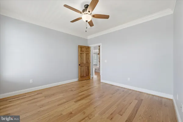 a bathroom with a sink double vanity and a mirror