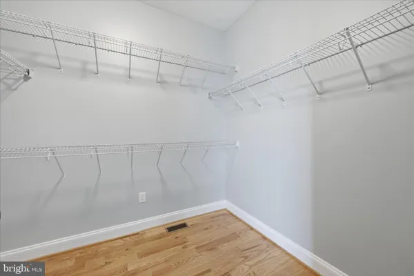 a view of a room with wooden walls