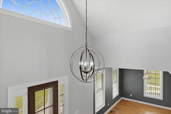 a view of a room with wooden walls