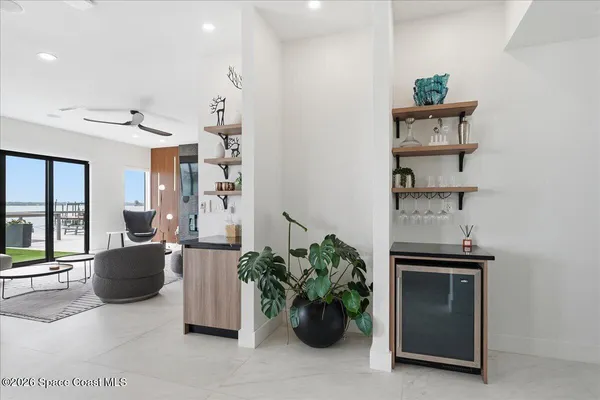 a view of a dining room with furniture and window