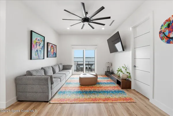 a view of a hallway with windows