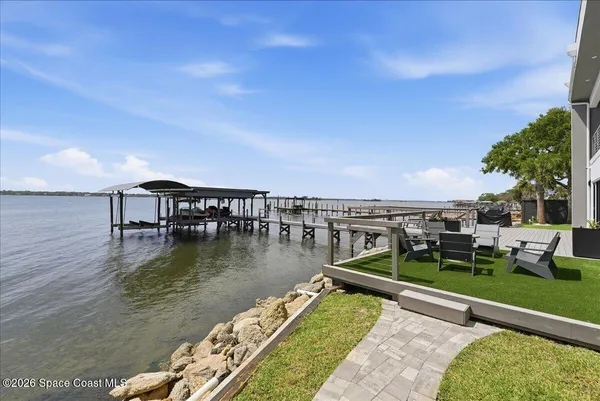 a view of a lake in middle of the house