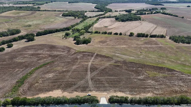 a view of a backyard of a house