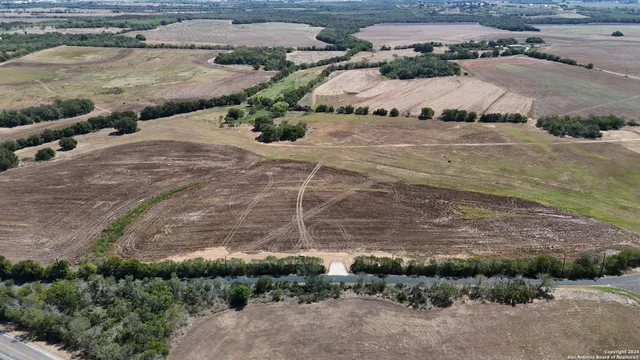 a view of a backyard of a house