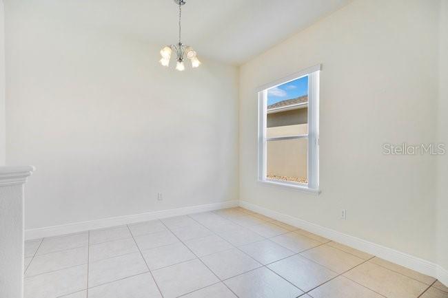 208 Lamonte Pointe Circle DeBary, FL 32713 - Photo 12 of 47 a view of an empty room with a window