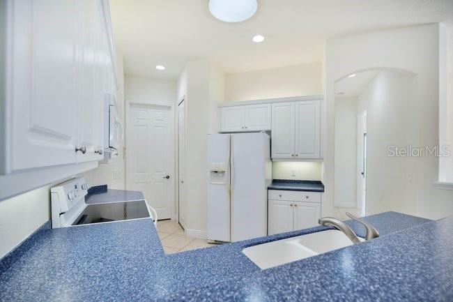 208 Lamonte Pointe Circle DeBary, FL 32713 - Photo 13 of 47 a spacious bathroom with a sink a toilet and shower