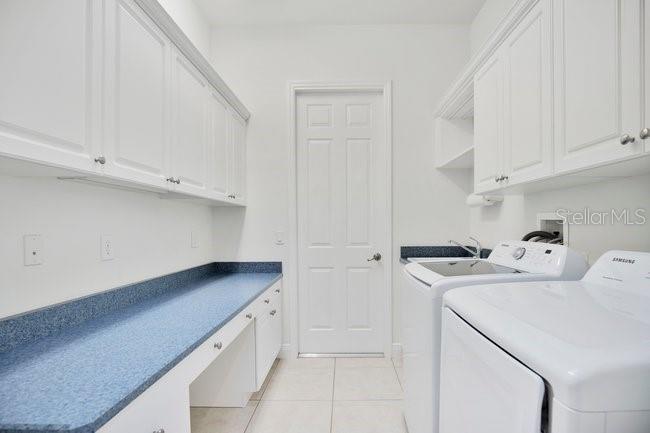 208 Lamonte Pointe Circle DeBary, FL 32713 - Photo 17 of 47 a utility room with sink dryer and washer