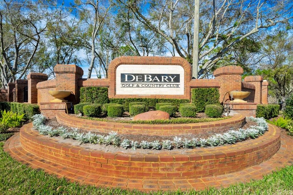 208 Lamonte Pointe Circle DeBary, FL 32713 - Photo 2 of 47 a sign that is sitting on a brick wall