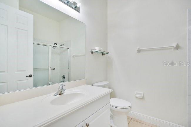 208 Lamonte Pointe Circle DeBary, FL 32713 - Photo 26 of 47 a bathroom with a sink toilet and vanity