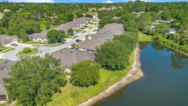 208 Lamonte Pointe Circle DeBary, FL 32713 - Photo 39 of 47 aerial view of a house with a yard and lake view