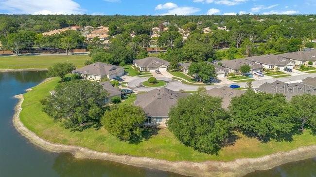 208 Lamonte Pointe Circle DeBary, FL 32713 - Photo 40 of 47 a view of a lake with a yard