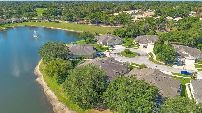 208 Lamonte Pointe Circle DeBary, FL 32713 - Photo 41 of 47 an aerial view of a house with swimming pool and lake view