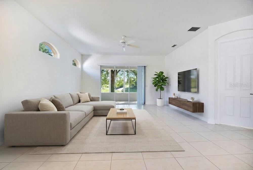 208 Lamonte Pointe Circle DeBary, FL 32713 - Photo 6 of 47 a living room with furniture and a flat screen tv