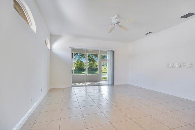 208 Lamonte Pointe Circle DeBary, FL 32713 - Photo 8 of 47 a view of an empty room with a window