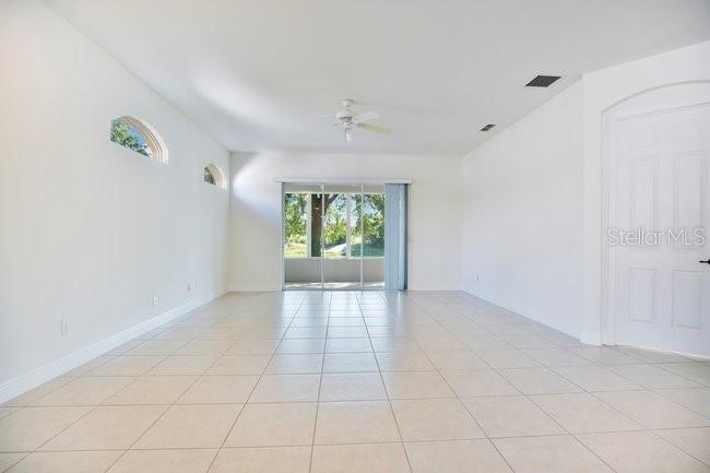 208 Lamonte Pointe Circle DeBary, FL 32713 - Photo 10 of 47 an empty room with windows