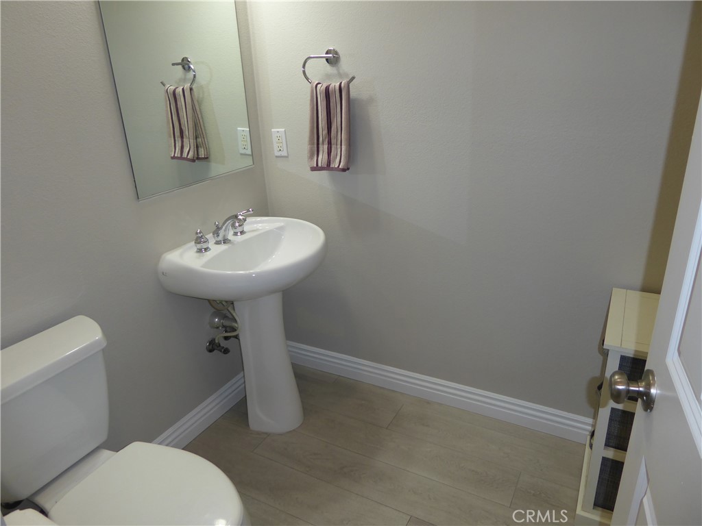 17115 Noble View Circle Riverside, CA 92503 - Photo 24 of 50 Downstairs 1/2 Bathroom close to all Family Areas.