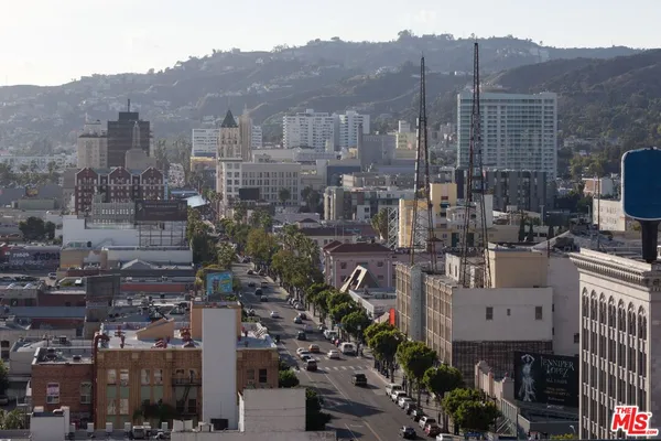 a view of city with tall buildings