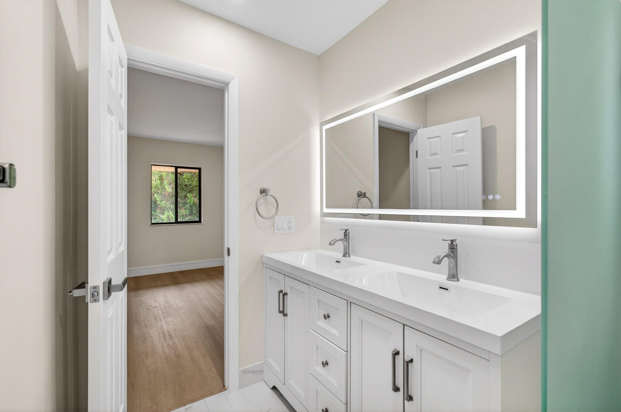 1330 Northwest 13th Street, Unit 12 Boca Raton, FL 33486 - Photo 27 of 52 a bathroom with a double vanity sink mirror and