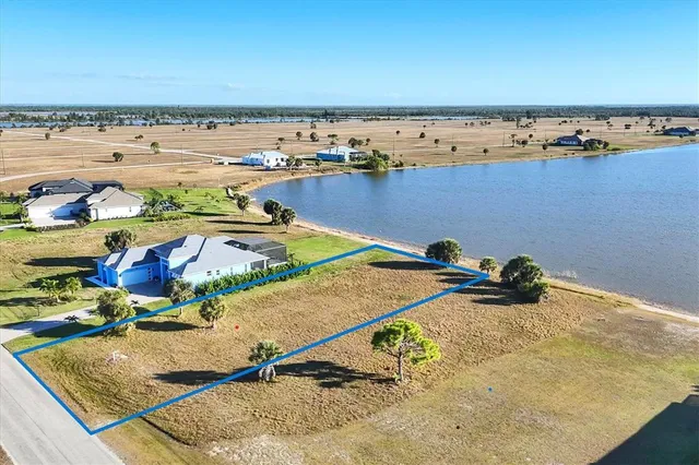 a view of a swimming pool and an ocean view