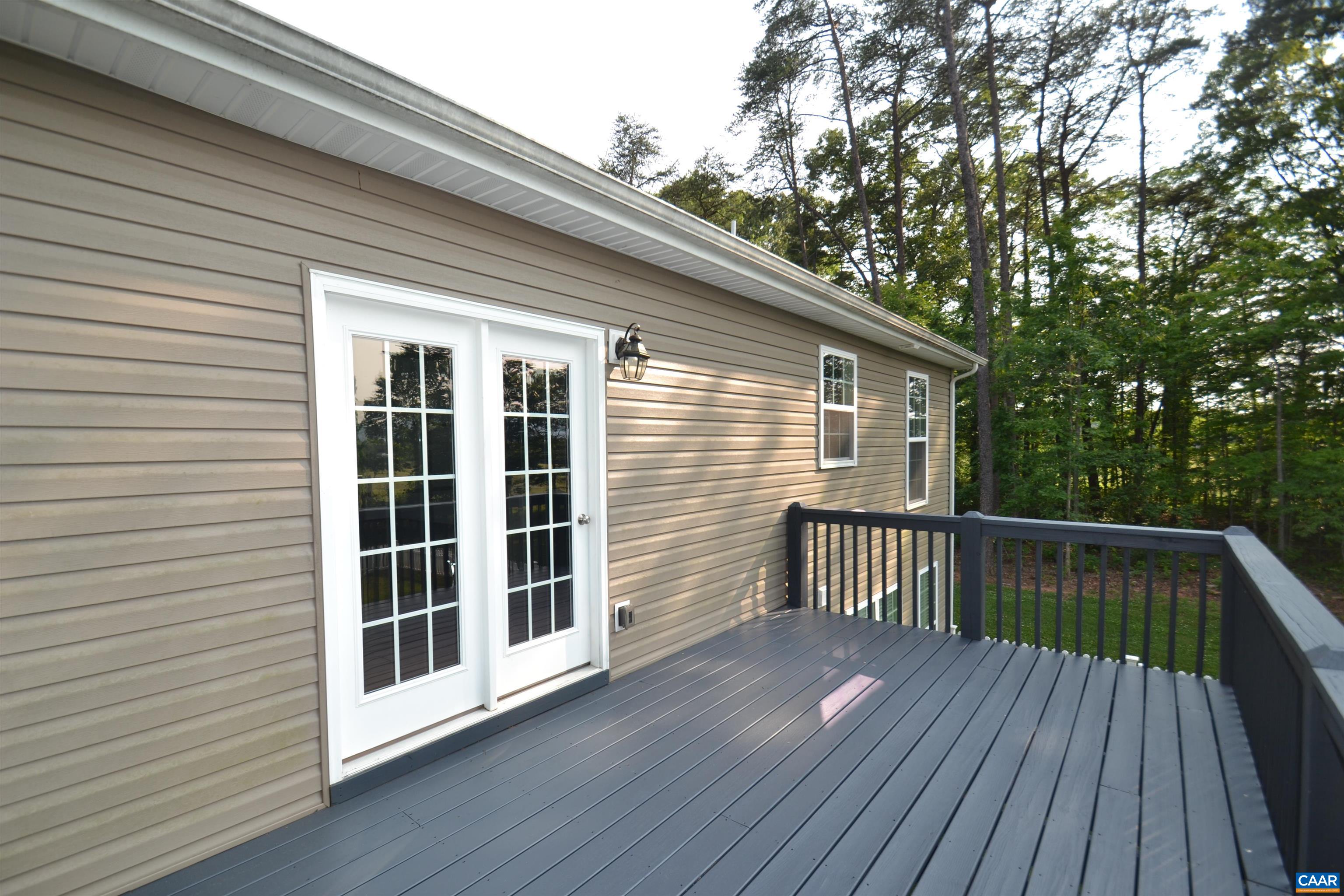 75 Chapel Road Ruckersville, VA 22968 - Photo 54 of 59 a view of backyard with deck and wooden floor