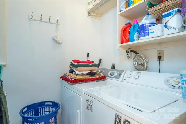 a bathroom with a sink and a shelf