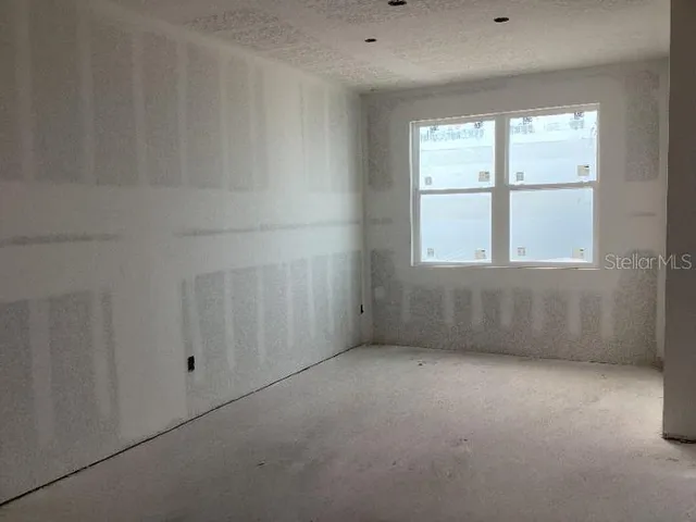 an empty room with a window