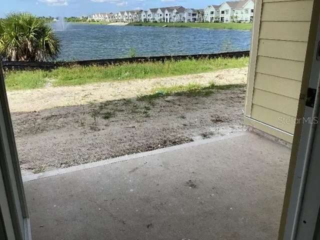 a view of a lake from a yard