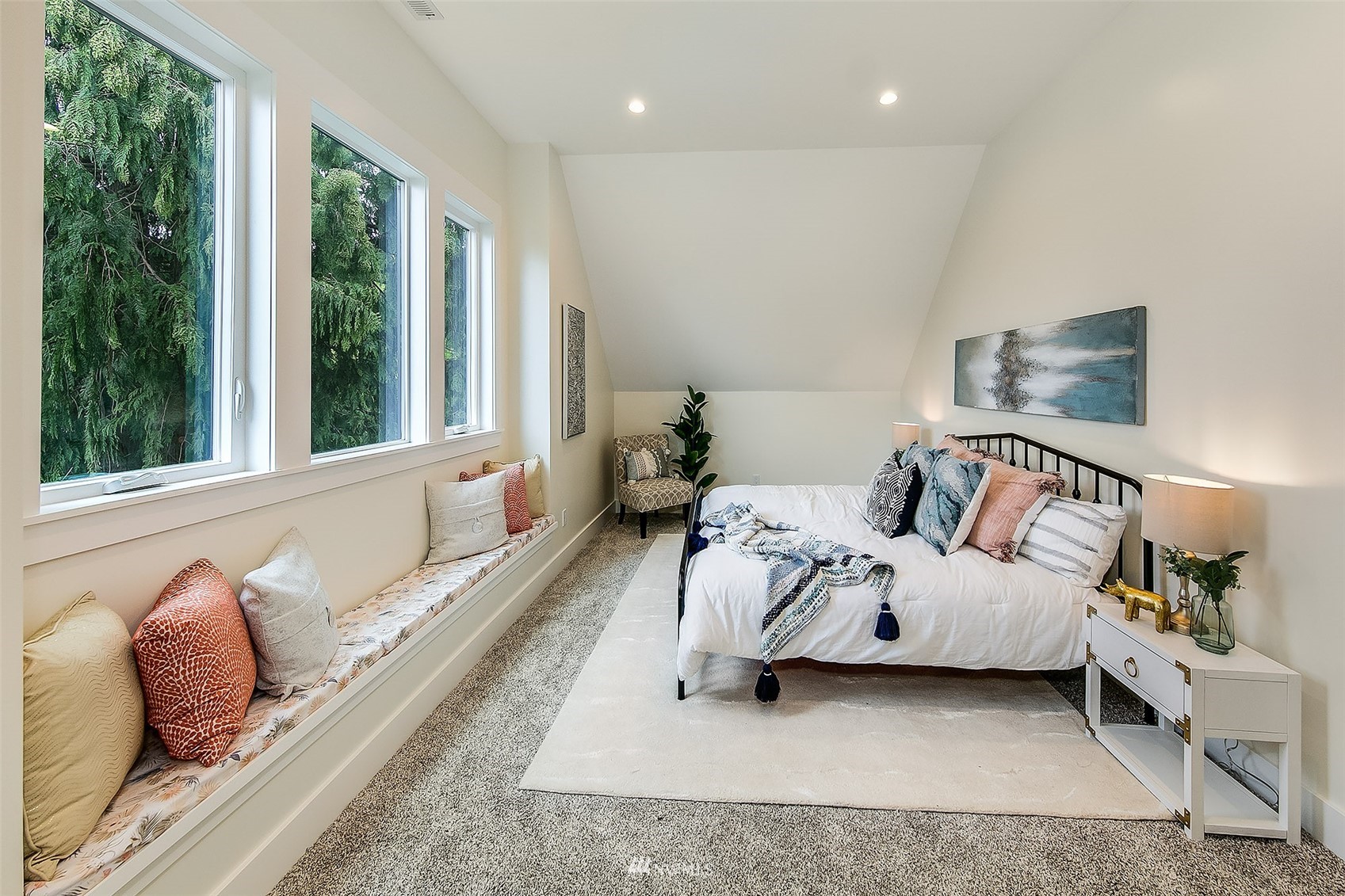 2143 6th Avenue West Seattle, WA 98119 - Photo 22 of 31 a bed room with a bed and a large window