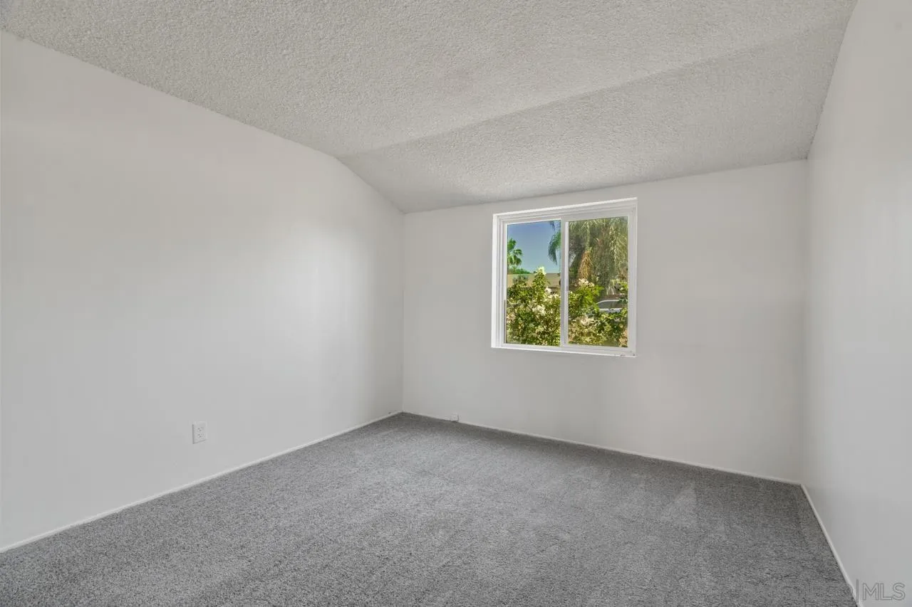 998 Joplin Drive El Cajon, CA 92021 - Photo 17 of 38 an empty room with windows