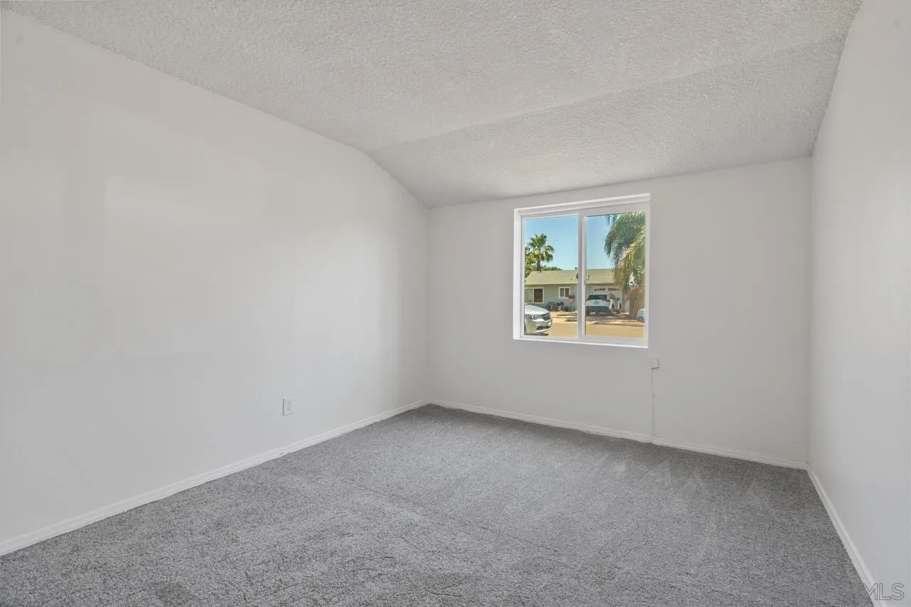 998 Joplin Drive El Cajon, CA 92021 - Photo 19 of 38 an empty room with windows