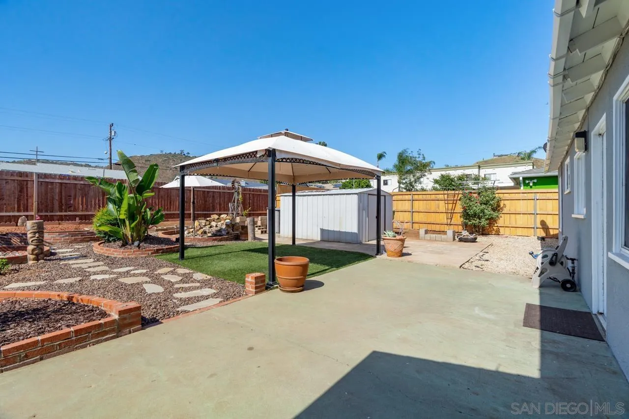 998 Joplin Drive El Cajon, CA 92021 - Photo 25 of 38 a view of a house with backyard porch and sitting area