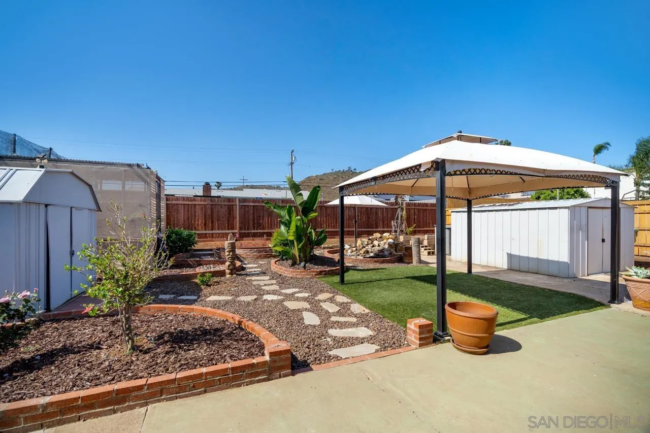 998 Joplin Drive El Cajon, CA 92021 - Photo 26 of 38 a front view of a house with garden