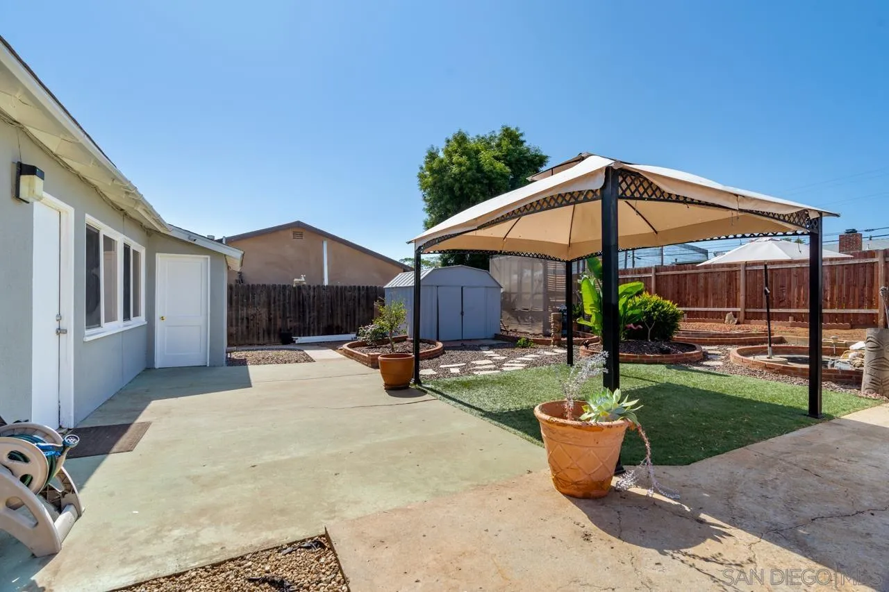 998 Joplin Drive El Cajon, CA 92021 - Photo 27 of 38 a view of a house with backyard and sitting area