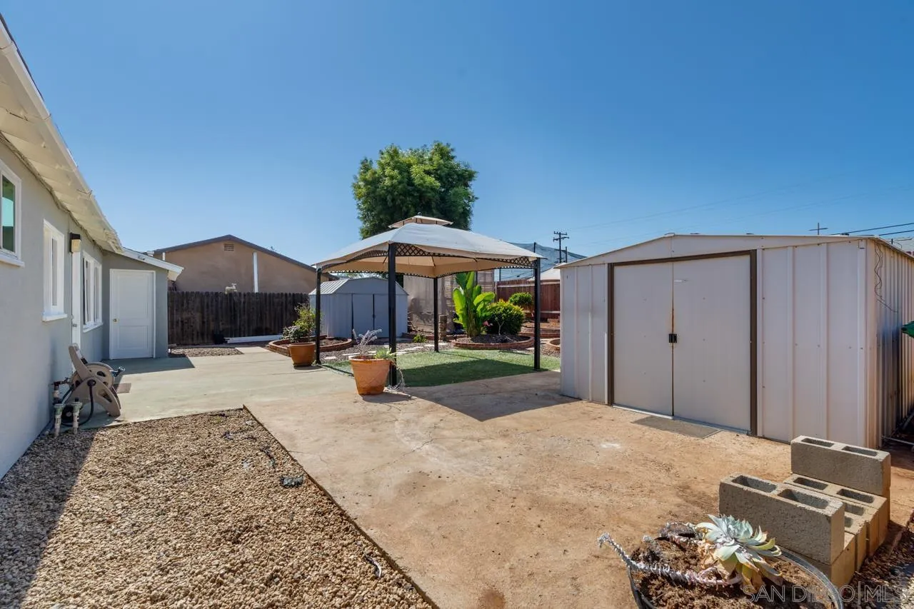 998 Joplin Drive El Cajon, CA 92021 - Photo 34 of 38 a view of a house with backyard and sitting area
