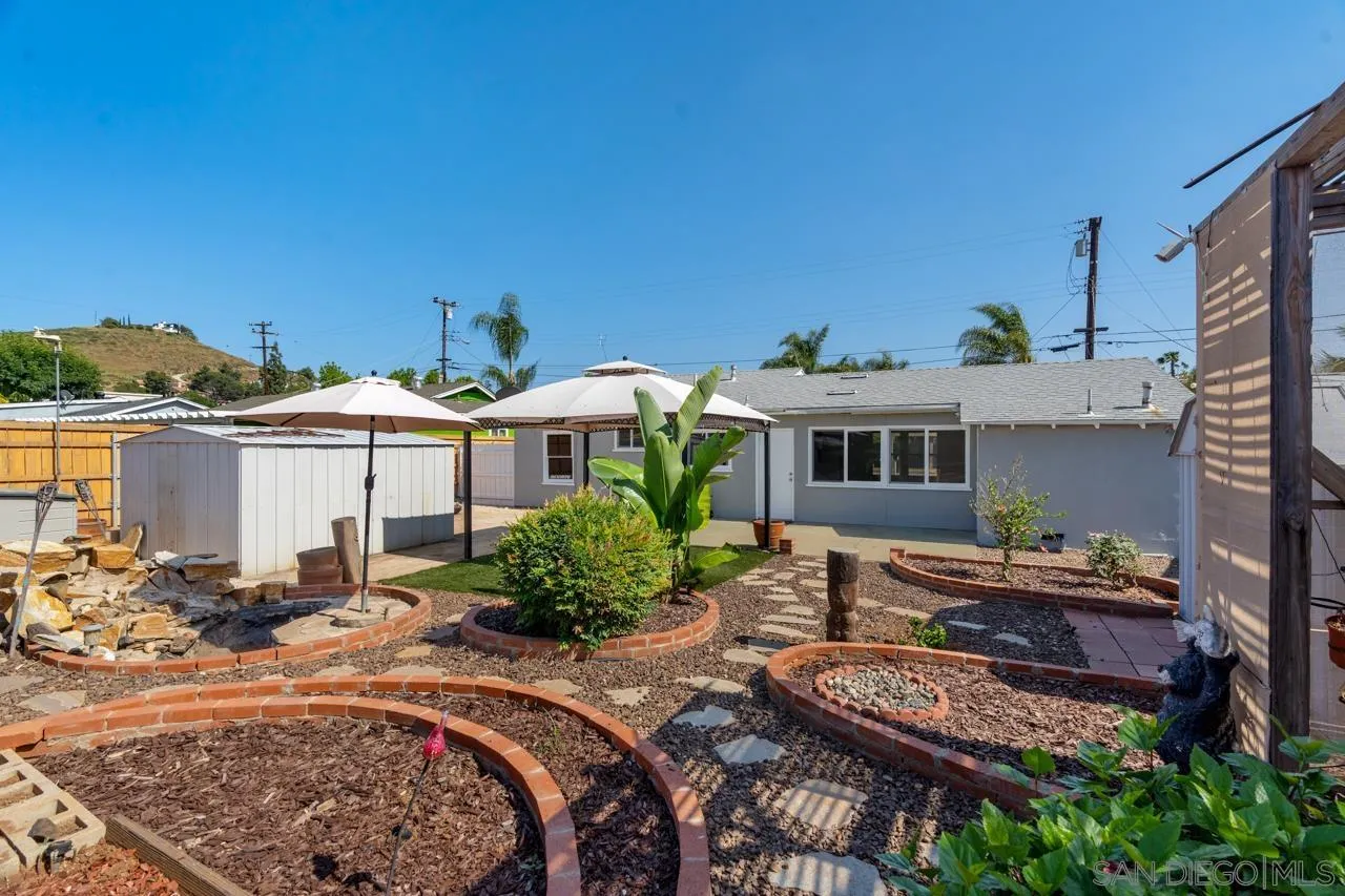 998 Joplin Drive El Cajon, CA 92021 - Photo 36 of 38 a view of a house with backyard and sitting area