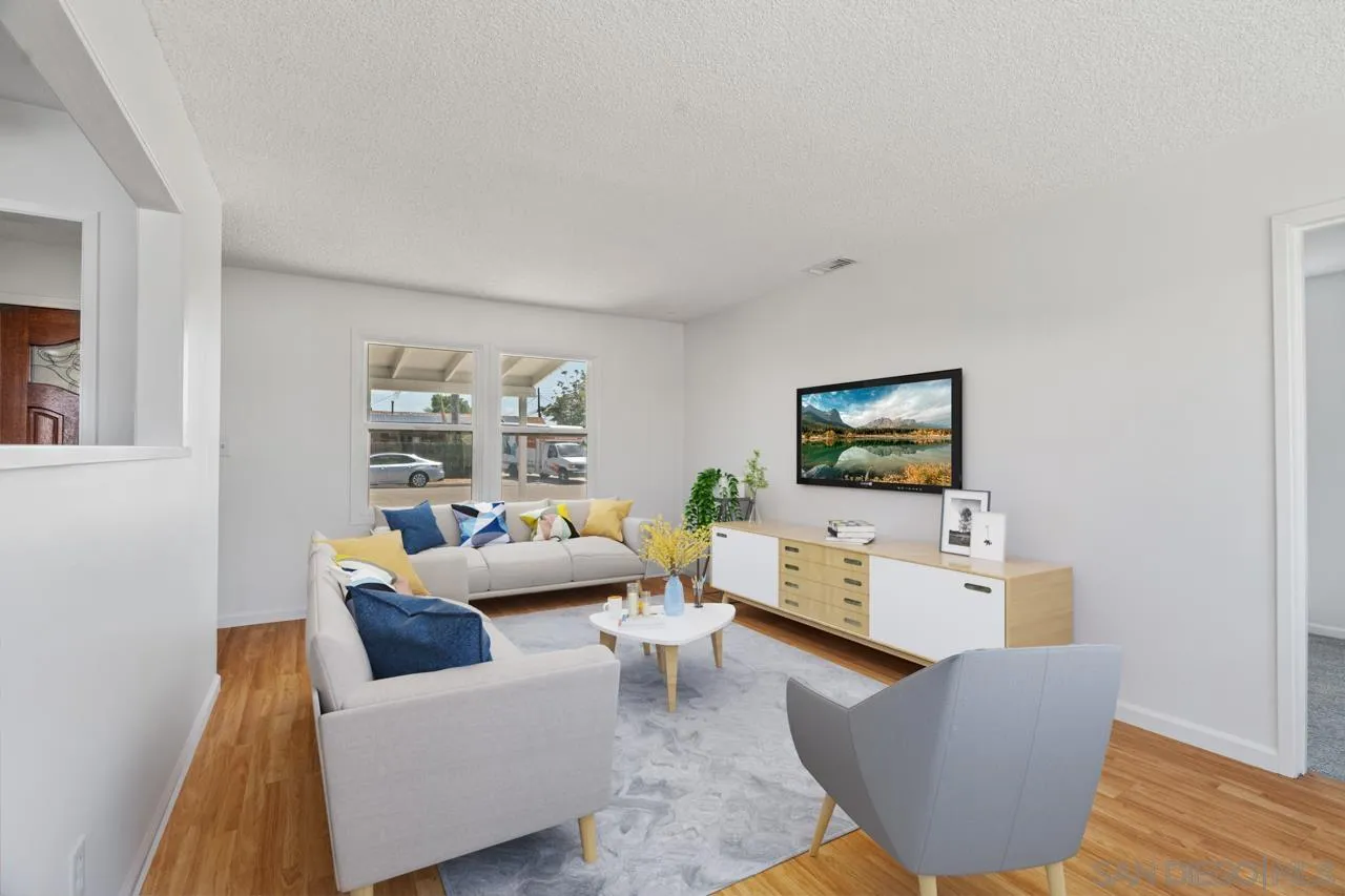 998 Joplin Drive El Cajon, CA 92021 - Photo 7 of 38 a living room with furniture and a flat screen tv