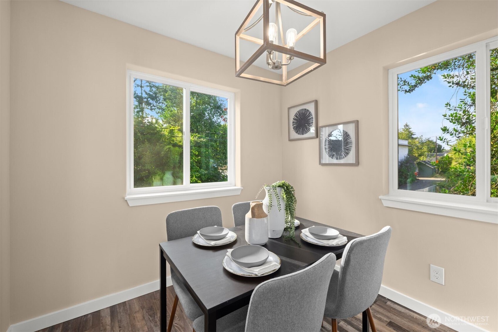 6419 Ellis Avenue South Seattle, WA 98108 - Photo 12 of 28 a view of a dining room with furniture a chandelier and a window
