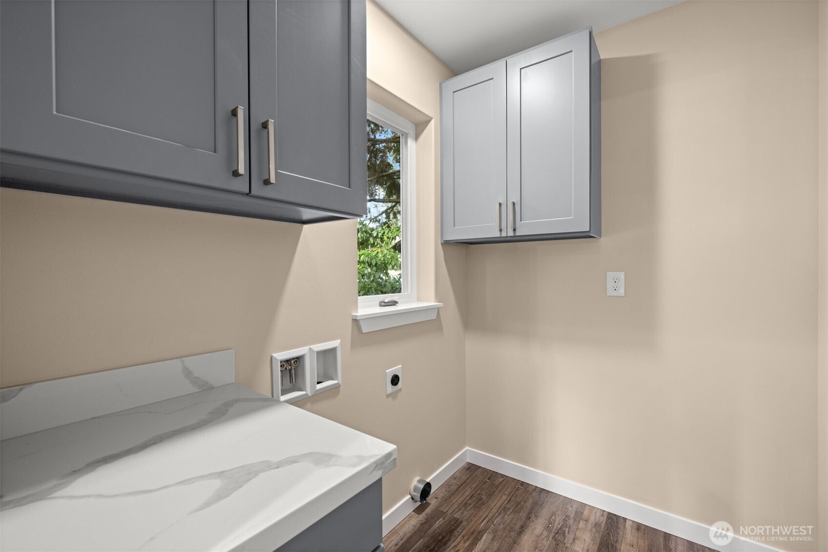6419 Ellis Avenue South Seattle, WA 98108 - Photo 13 of 28 a bedroom with a bed and cabinets