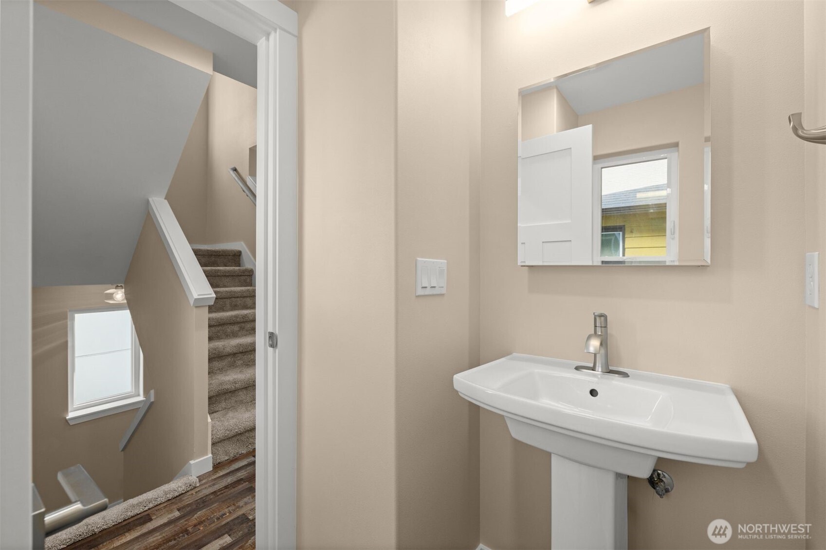6419 Ellis Avenue South Seattle, WA 98108 - Photo 14 of 28 a bathroom with a sink and a mirror
