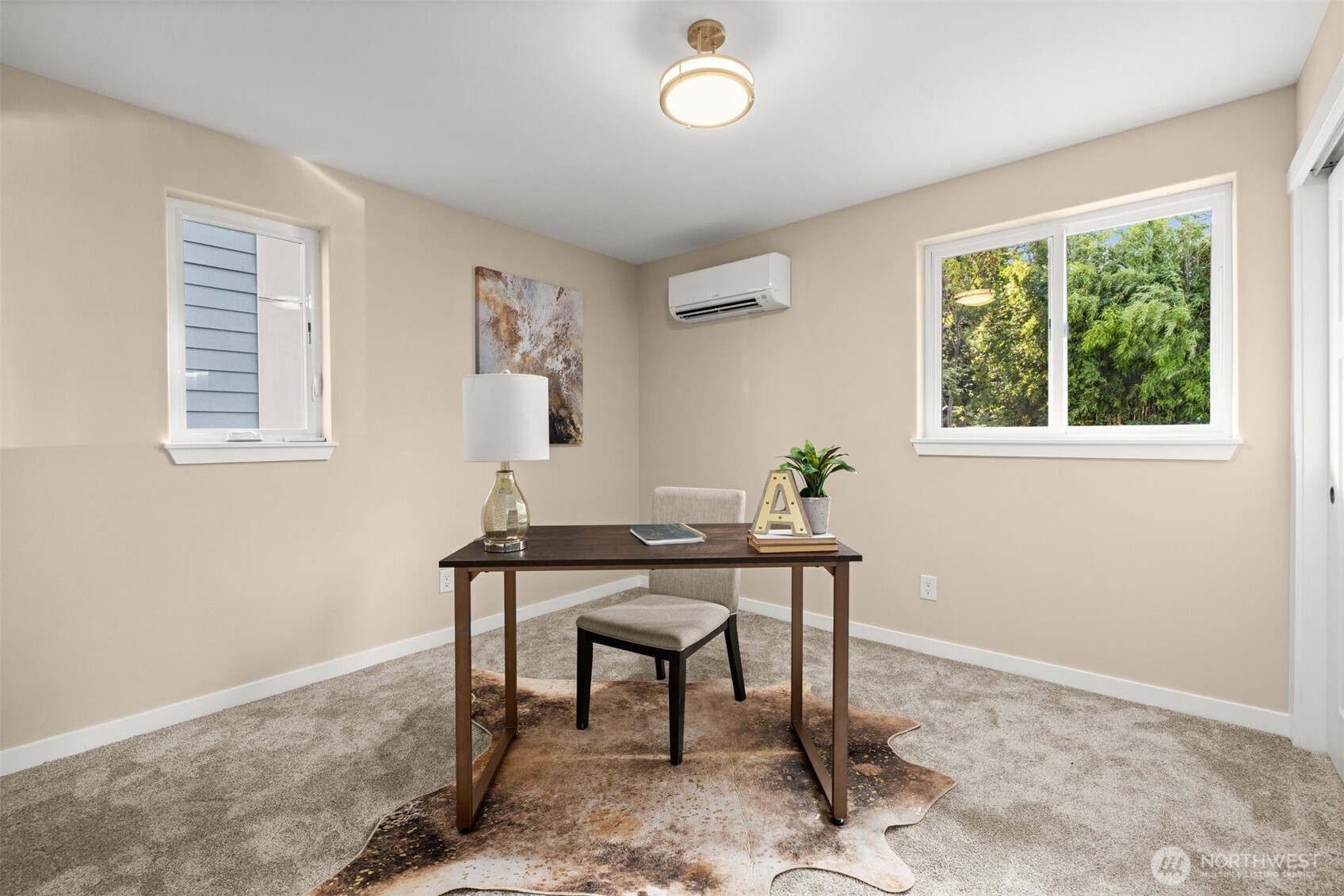 6419 Ellis Avenue South Seattle, WA 98108 - Photo 16 of 28 a view of a workspace with furniture and a window
